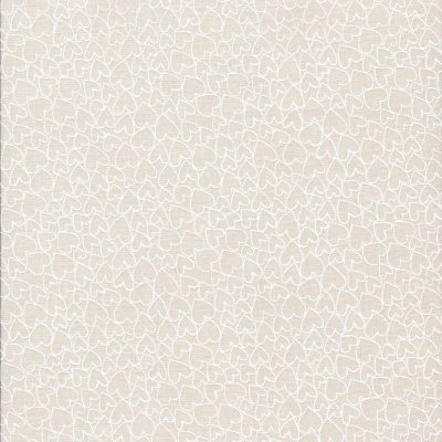Pastel zalmkleur stof met witte hartjes