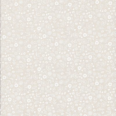 Pastel zalmkleur stof met witte bloemetjes