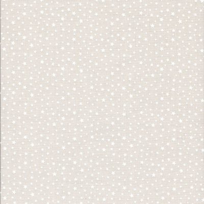 Pastel zalmkleur stof met witte sterretjes