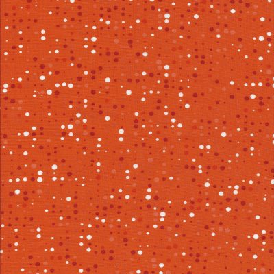 Oranje stof met witte en donker oranje stippen